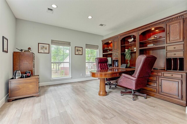 15050 Lake Paula Dr, Willis, TX 77318 - office area featuring light wood-style floors, baseboards, and recessed lighting
