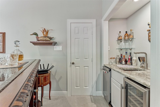 15050 Lake Paula Dr, Willis, TX 77318 - indoor dry bar featuring beverage cooler and baseboards