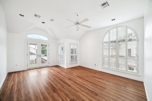 unfurnished living room featuring visible vents, french doors, a ceiling fan, and wood finished floors