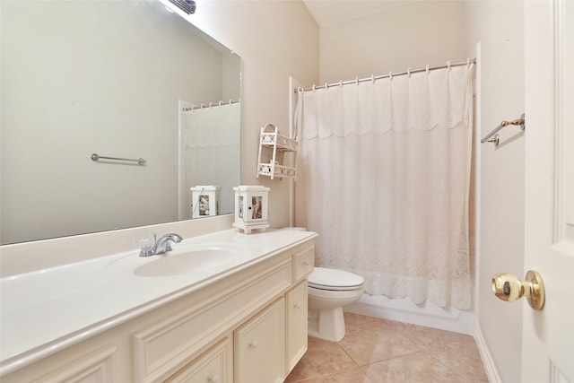 bathroom featuring toilet, tile patterned flooring, vanity, and shower / tub combo with curtain