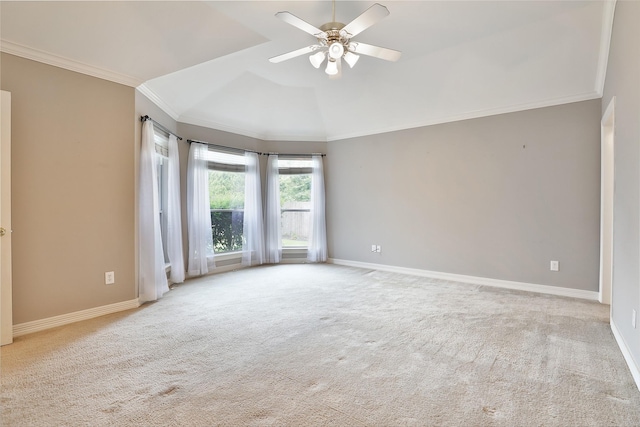 unfurnished room with carpet flooring, crown molding, a ceiling fan, and lofted ceiling