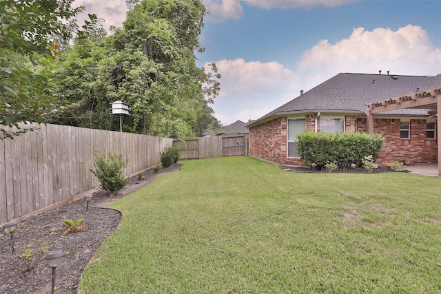 view of yard featuring a fenced backyard
