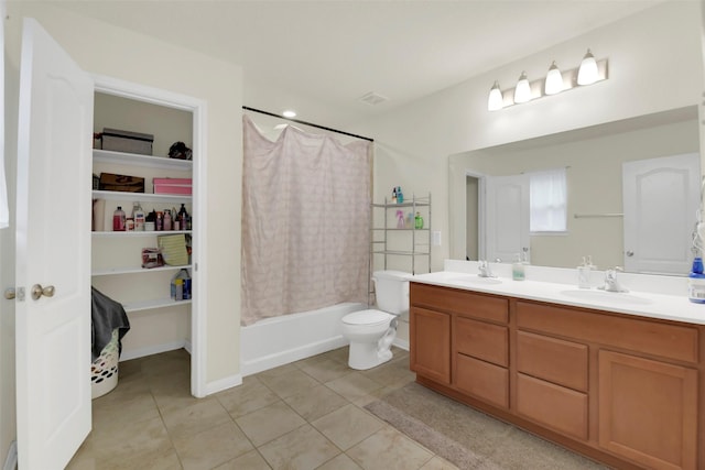 4826 Westfield Pines Dr, Katy, TX 77449 - bathroom featuring tile patterned flooring, double vanity, shower / tub combo with curtain, and toilet