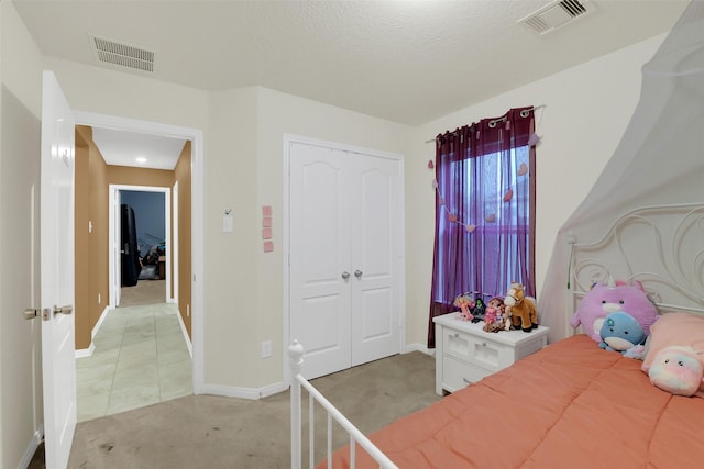 4826 Westfield Pines Dr, Katy, TX 77449 - bedroom with light colored carpet, a closet, and baseboards