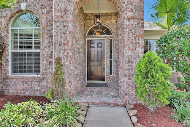 18239 Rustic Springs Dr, Tomball, TX 77375 - property entrance featuring brick siding