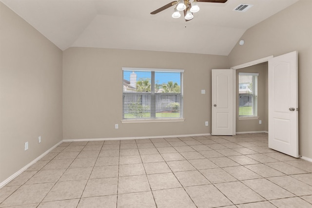 18239 Rustic Springs Dr, Tomball, TX 77375 - unfurnished room with vaulted ceiling, a ceiling fan, baseboards, and light tile patterned floors