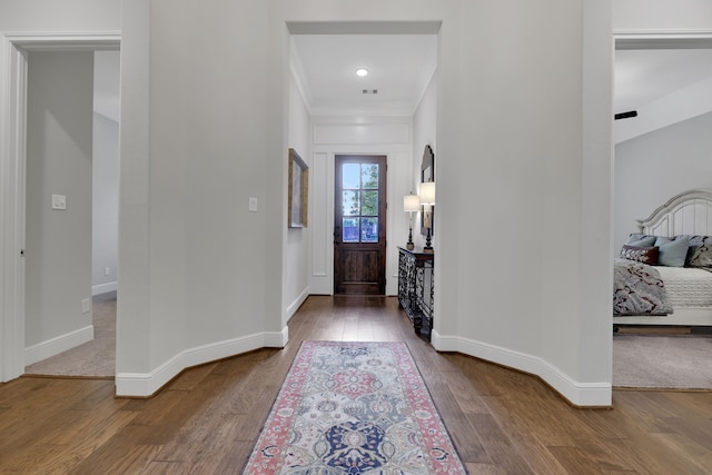 1614 Primrose Ln, Katy, TX 77493 - foyer entrance featuring wood finished floors, baseboards, and crown molding