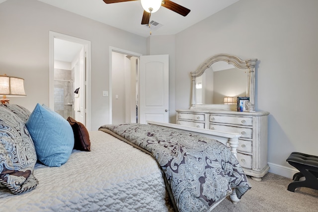1614 Primrose Ln, Katy, TX 77493 - bedroom featuring carpet floors, a ceiling fan, baseboards, and ensuite bathroom