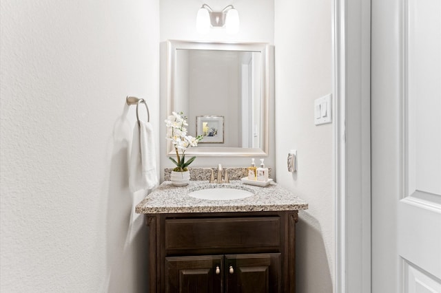 1614 Primrose Ln, Katy, TX 77493 - bathroom featuring vanity and a textured wall