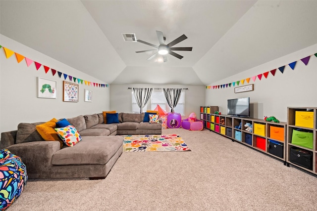 rec room with a ceiling fan, visible vents, carpet floors, and vaulted ceiling