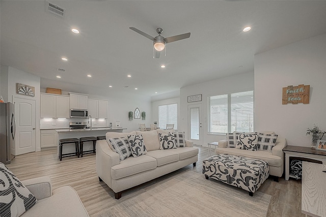 1672 Happy Valley St, Montgomery, TX 77316 - living room with ceiling fan, light wood-style flooring, visible vents, and recessed lighting