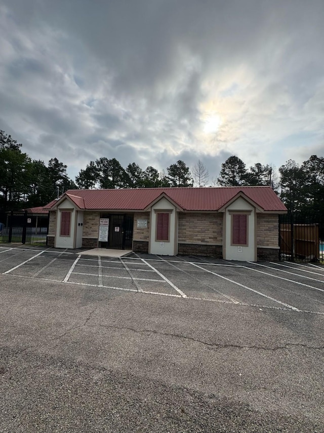 6902 Woodland Oaks, Magnolia, TX 77354 - view of property with uncovered parking and fence