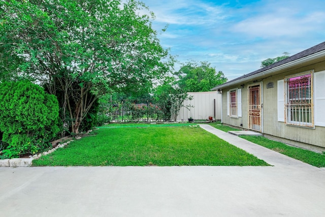 view of yard featuring a patio area and fence