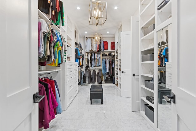 29314 Village Rdg, Magnolia, TX 77355 - walk in closet with marble finish floor and a notable chandelier