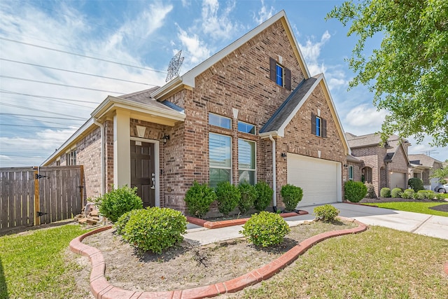19911 Whistle Creek Ln, Cypress, TX 77433 - view of front of property featuring fence, a front yard, brick siding, and driveway