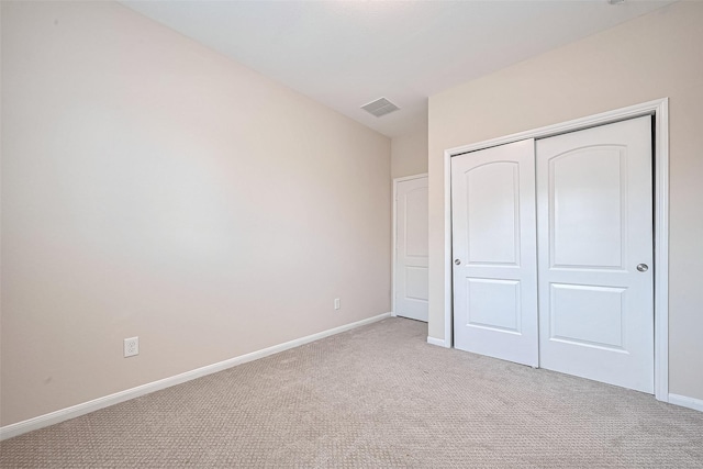 19911 Whistle Creek Ln, Cypress, TX 77433 - unfurnished bedroom featuring carpet, baseboards, a closet, and visible vents