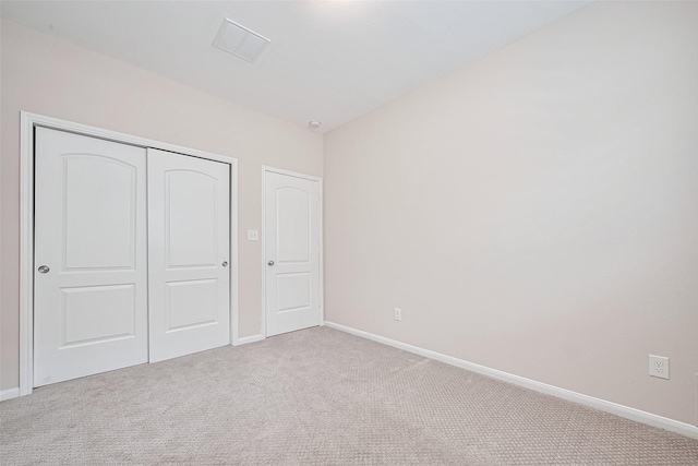 19911 Whistle Creek Ln, Cypress, TX 77433 - unfurnished bedroom with carpet flooring, a closet, visible vents, and baseboards