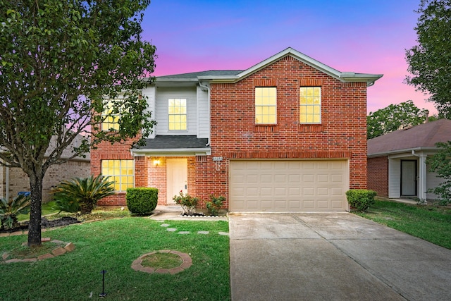 5315 Cilantro Ln, Baytown, TX 77521 - traditional-style home featuring concrete driveway, an attached garage, a front lawn, and brick siding