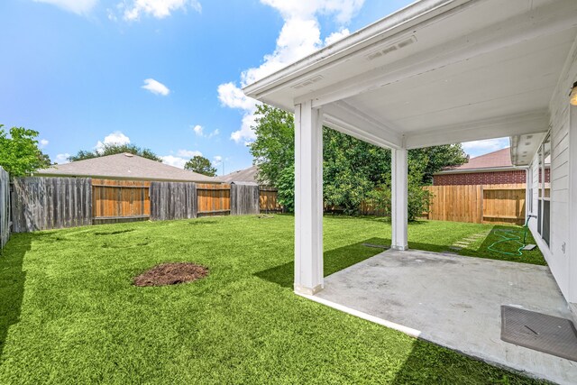 5315 Cilantro Ln, Baytown, TX 77521 - view of yard featuring a patio area