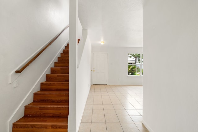 5315 Cilantro Ln, Baytown, TX 77521 - staircase with tile patterned flooring and baseboards