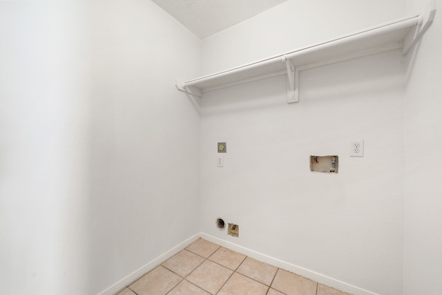 5315 Cilantro Ln, Baytown, TX 77521 - washroom featuring electric dryer hookup, washer hookup, baseboards, and light tile patterned floors