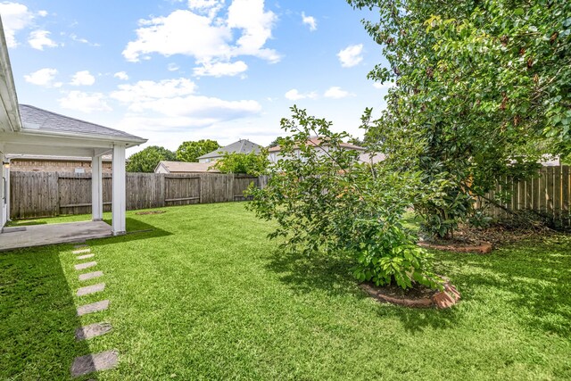 5315 Cilantro Ln, Baytown, TX 77521 - view of yard with a patio