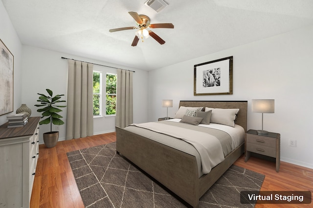 5315 Cilantro Ln, Baytown, TX 77521 - bedroom with dark wood-style floors, baseboards, and ceiling fan