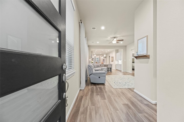 7015 Winterberry Glen Ln, Katy, TX 77493 - corridor featuring baseboards, recessed lighting, light wood finished floors, and visible vents