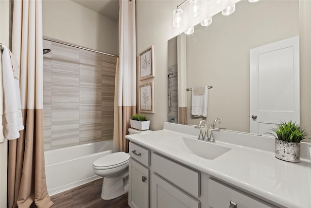 7015 Winterberry Glen Ln, Katy, TX 77493 - full bathroom with vanity, toilet, shower / bathtub combination with curtain, and wood finished floors