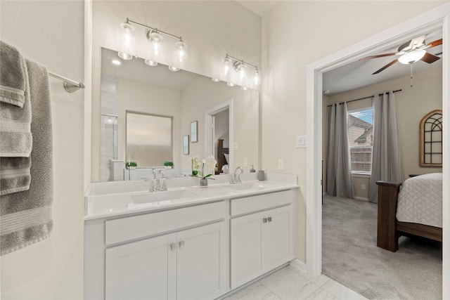 7015 Winterberry Glen Ln, Katy, TX 77493 - bathroom featuring double vanity, ensuite bathroom, ceiling fan, and a sink