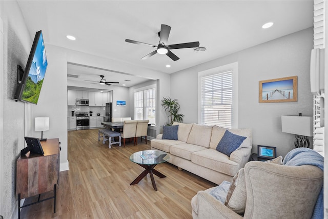 1802 Ursuline St, Galveston, TX 77550 - living room with recessed lighting, light wood-style floors, and ceiling fan