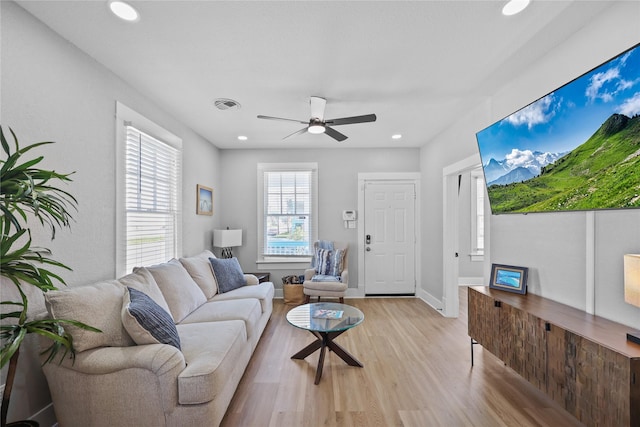 1802 Ursuline St, Galveston, TX 77550 - living room featuring a ceiling fan, recessed lighting, visible vents, and light wood-type flooring