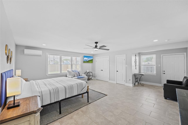 1802 Ursuline St, Galveston, TX 77550 - bedroom featuring a wall mounted air conditioner, multiple closets, baseboards, ceiling fan, and recessed lighting
