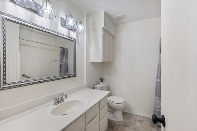 bathroom featuring toilet, vanity, baseboards, and a shower with shower curtain