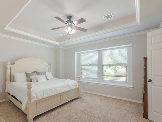 18303 Hillingdon Ln, Tomball, TX 77377 - bedroom with a tray ceiling, light colored carpet, baseboards, and crown molding