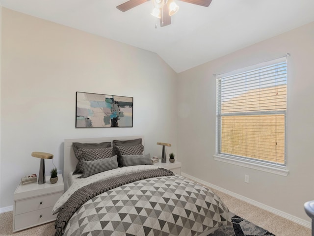 18303 Hillingdon Ln, Tomball, TX 77377 - carpeted bedroom with baseboards, vaulted ceiling, and a ceiling fan