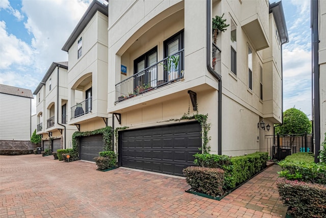 2303 Hadley St, Houston, TX 77003 - view of property with a garage and decorative driveway