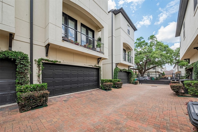 2303 Hadley St, Houston, TX 77003 - view of property with an attached garage and decorative driveway