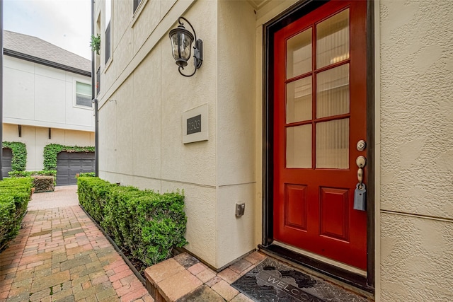 2303 Hadley St, Houston, TX 77003 - doorway to property featuring stucco siding