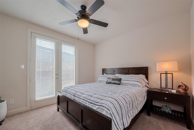2303 Hadley St, Houston, TX 77003 - carpeted bedroom with access to exterior, baseboards, and ceiling fan