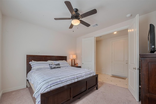 2303 Hadley St, Houston, TX 77003 - bedroom featuring light colored carpet, baseboards, and ceiling fan