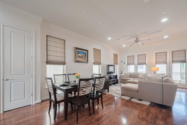 2303 Hadley St, Houston, TX 77003 - dining area featuring crown molding, dark wood-style flooring, recessed lighting, a ceiling fan, and baseboards