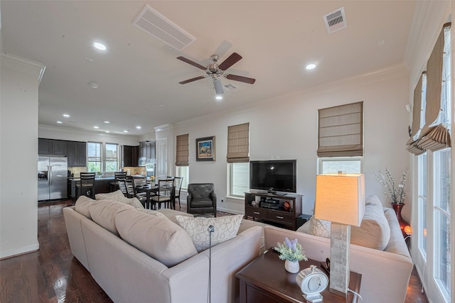 2303 Hadley St, Houston, TX 77003 - living room with crown molding, dark wood-style floors, recessed lighting, and a ceiling fan