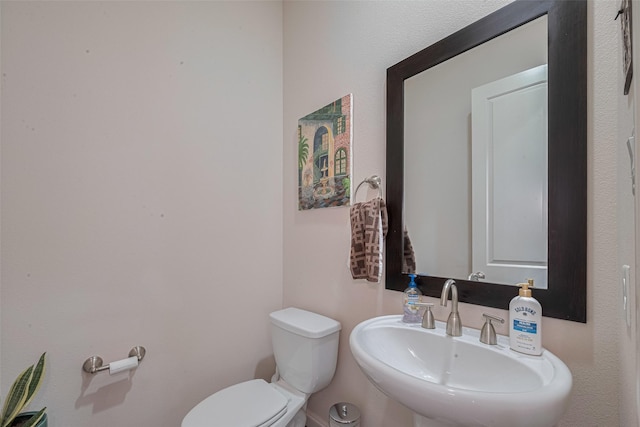 2303 Hadley St, Houston, TX 77003 - half bath with a sink and toilet
