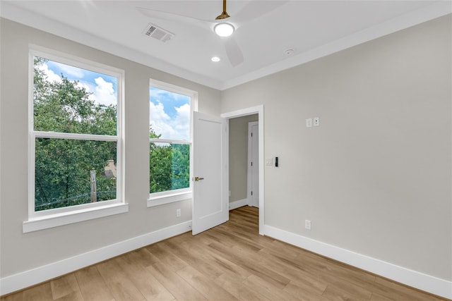 602 W 28th St Unit B, Houston, TX 77008 - spare room featuring light wood-style flooring, baseboards, a ceiling fan, and visible vents