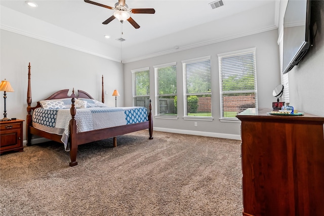 carpeted bedroom with baseboards, recessed lighting, ornamental molding, and visible vents