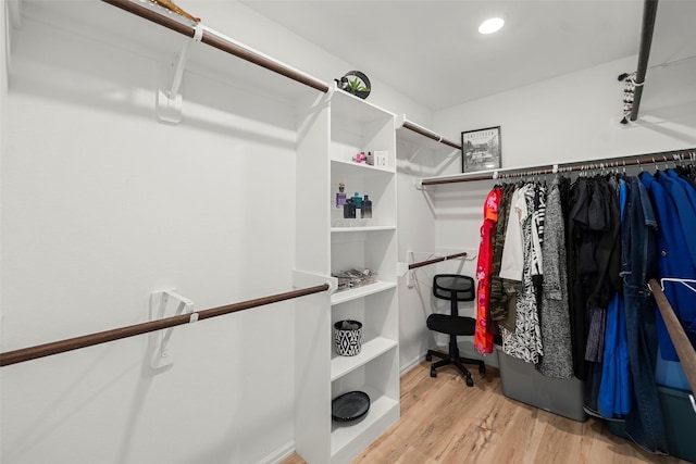 908 Pickering Oak Row, Magnolia, TX 77354 - spacious closet featuring wood finished floors
