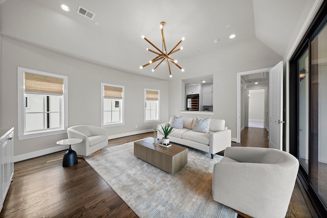 5412 Jackson St, Houston, TX 77004 - living room featuring dark wood-style flooring, recessed lighting, a chandelier, and baseboards