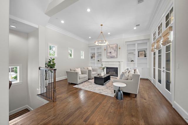 5412 Jackson St, Houston, TX 77004 - living room featuring baseboards, recessed lighting, dark wood finished floors, ornamental molding, and a glass covered fireplace