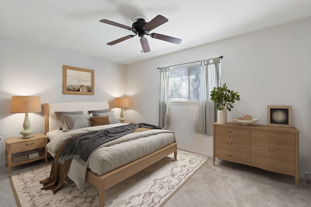 6615 Ampton Dr, Spring, TX 77379 - bedroom with light carpet and a ceiling fan
